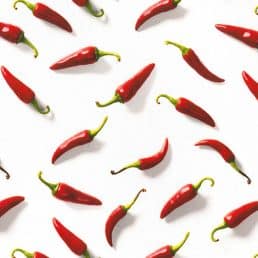 Chillies on White Cotton Canvas